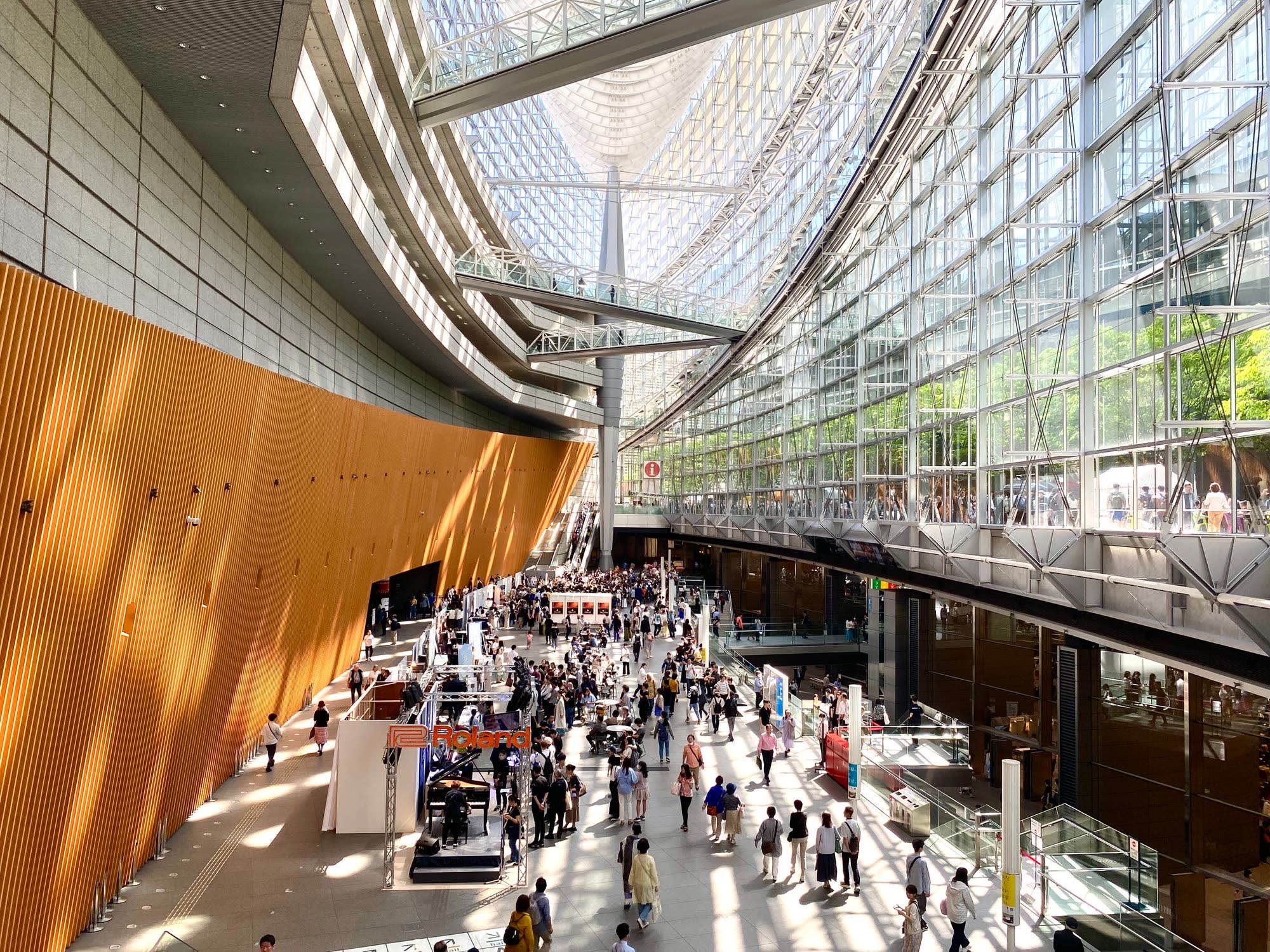 An exhibition stand on the concourse of a large indoor public building