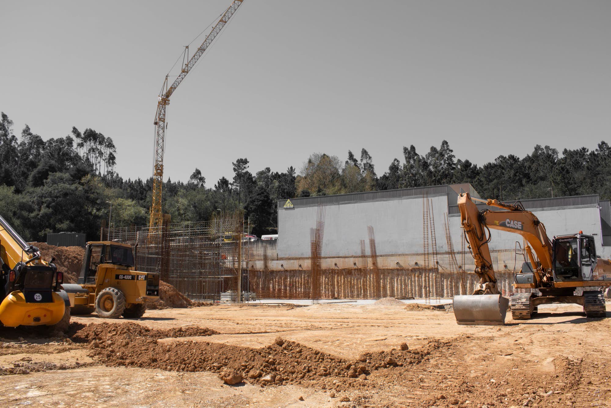 Excavators and a tower crane on a construction site